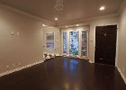 A lovely livingroom with french windows that open into the courtyard.jpg